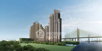 Stunning riverside high-rise buildings with lush greenery and bridge view