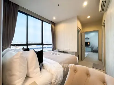 Luxurious bedroom with stunning city view and modern decor
