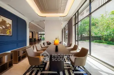 Luxurious modern dining area with large windows and elegant decor
