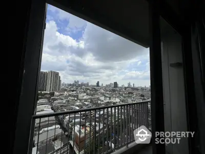 Stunning cityscape view from high-rise balcony with expansive skyline and urban landscape.