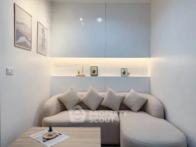 Modern living room with stylish sofa and minimalist decor