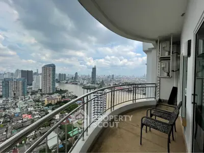 Stunning high-rise balcony with panoramic city and river views