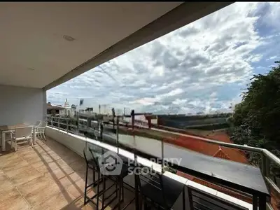 Spacious balcony with stunning panoramic view and outdoor seating