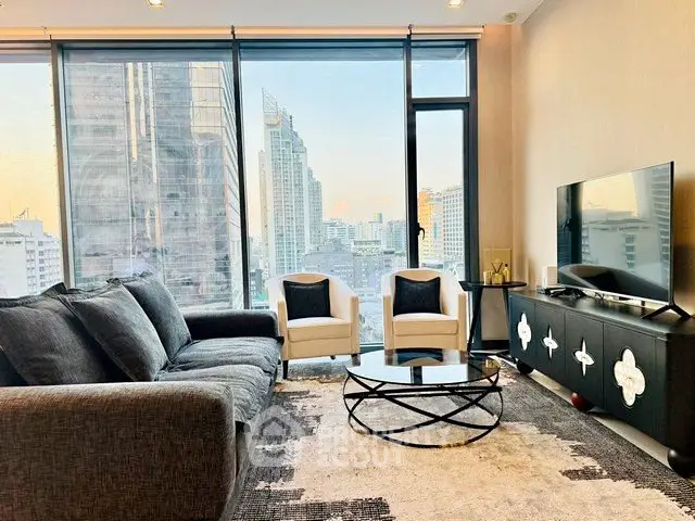 Luxurious modern living room with stunning city view, featuring elegant furniture and floor-to-ceiling windows.