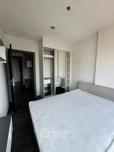 Modern bedroom with sleek design and built-in wardrobe