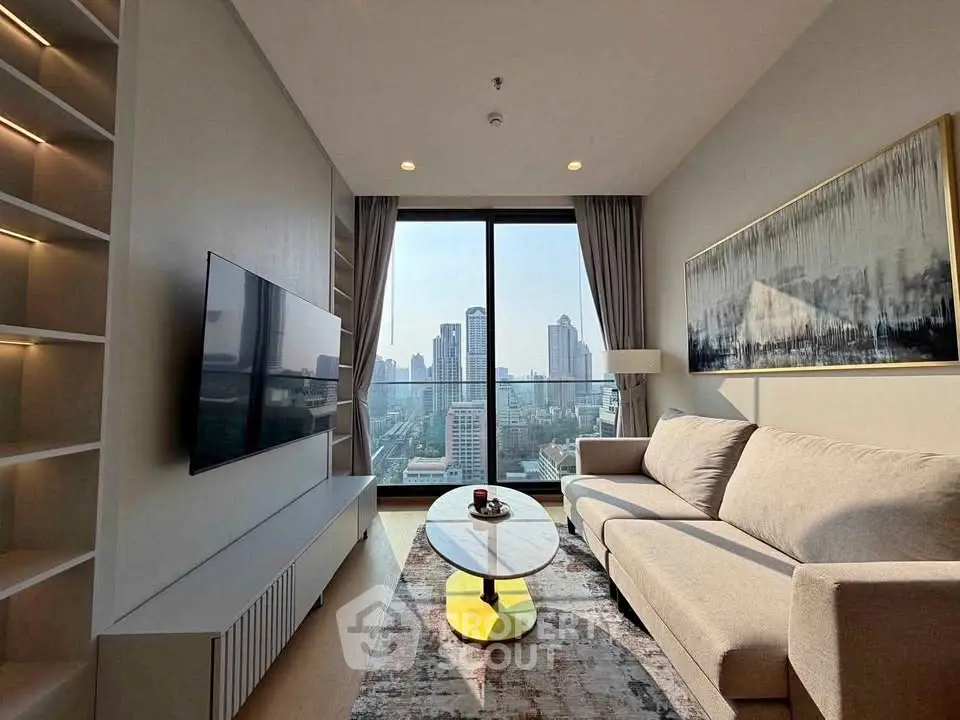 Modern living room with stunning city view, large sofa, and wall-mounted TV in high-rise apartment.