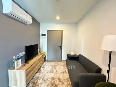 Modern living room with cozy sofa and stylish decor