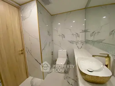 Luxurious marble bathroom with modern fixtures and elegant design