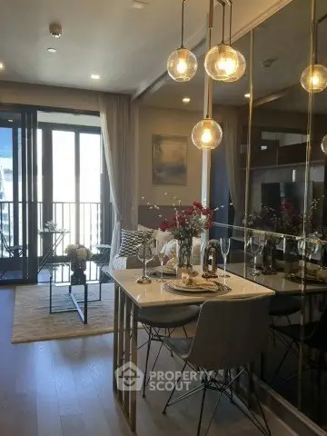 Modern living room with elegant dining area and balcony view