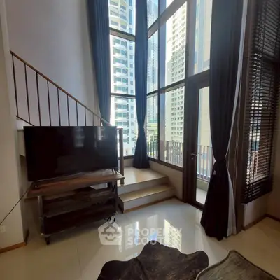 Luxurious high-rise living room with floor-to-ceiling windows and stunning city views.