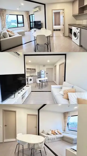 Modern apartment interior with open layout, featuring living room, dining area, and kitchen with washing machine.