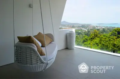 Luxurious balcony with stunning panoramic view and stylish hanging chair