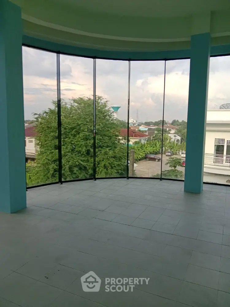 Spacious balcony with panoramic view of suburban neighborhood