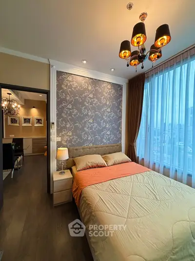 Luxurious bedroom with elegant lighting and city view, perfect for urban living.