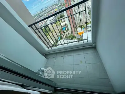 High-rise balcony with stunning cityscape view, perfect for urban living enthusiasts.
