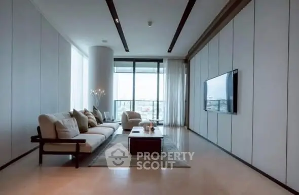 Luxurious modern living room with large windows and elegant decor