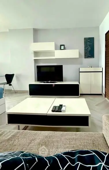 Modern living room with sleek furniture and minimalist decor