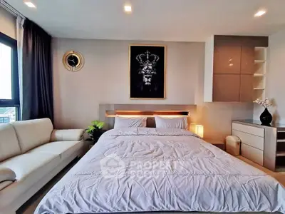 Luxurious bedroom with modern decor and elegant lighting in a high-end apartment.