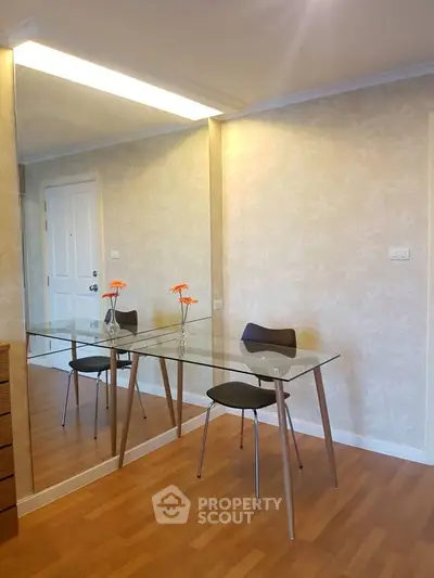 Stylish modern study room with glass table and elegant decor