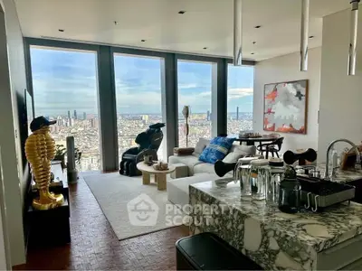 Luxurious living room with stunning city view, modern decor, and marble kitchen island in high-rise apartment.