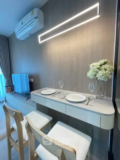 Modern living room with sleek dining area and stylish decor