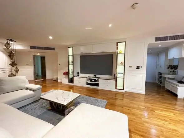 Spacious modern living room with elegant decor and hardwood floors