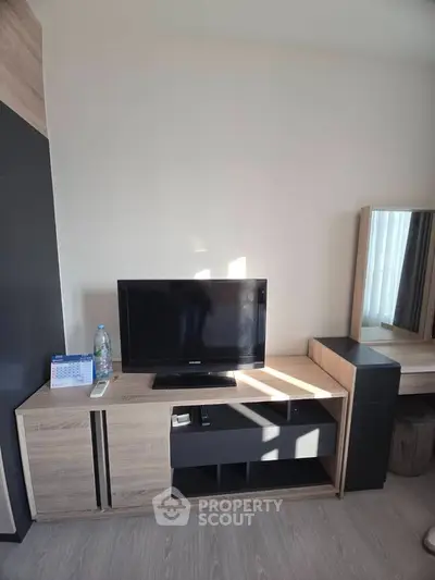 Modern living room with sleek TV stand and stylish decor