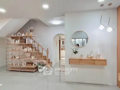 Modern minimalist living room with stylish decor and open layout