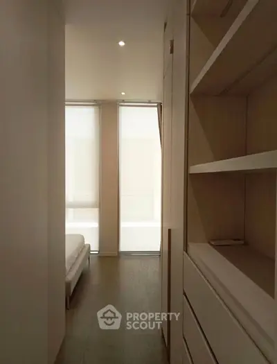 Sleek modern bedroom with minimalist design and natural light