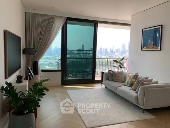 Spacious living room with stunning city view and modern decor