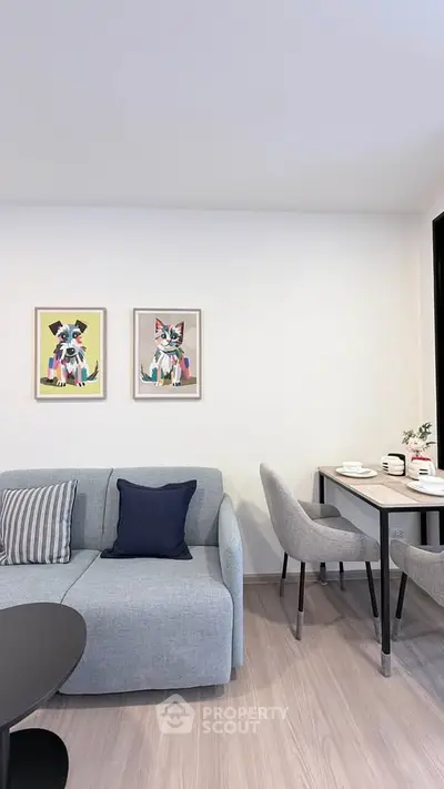 Modern living room with stylish decor and cozy seating area.