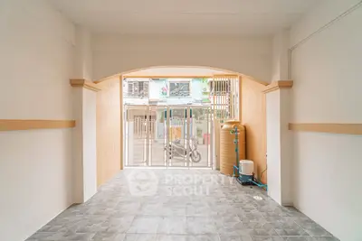 Spacious entrance area with tiled flooring and modern design