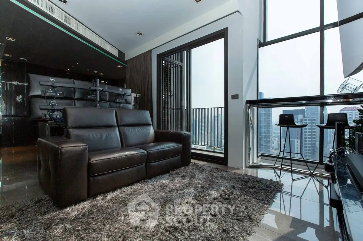 Luxurious modern living room with city view and sleek black leather sofa.
