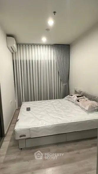 Modern bedroom with sleek design and natural light