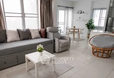 Modern living room with stylish furniture and natural light