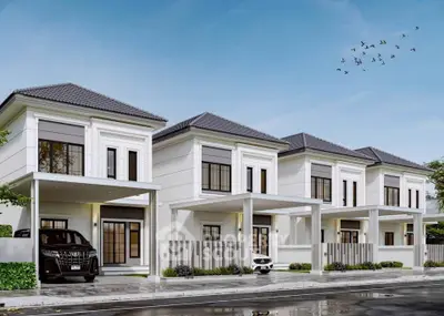 Elegant modern townhouses with sleek design and spacious driveways in a serene neighborhood.
