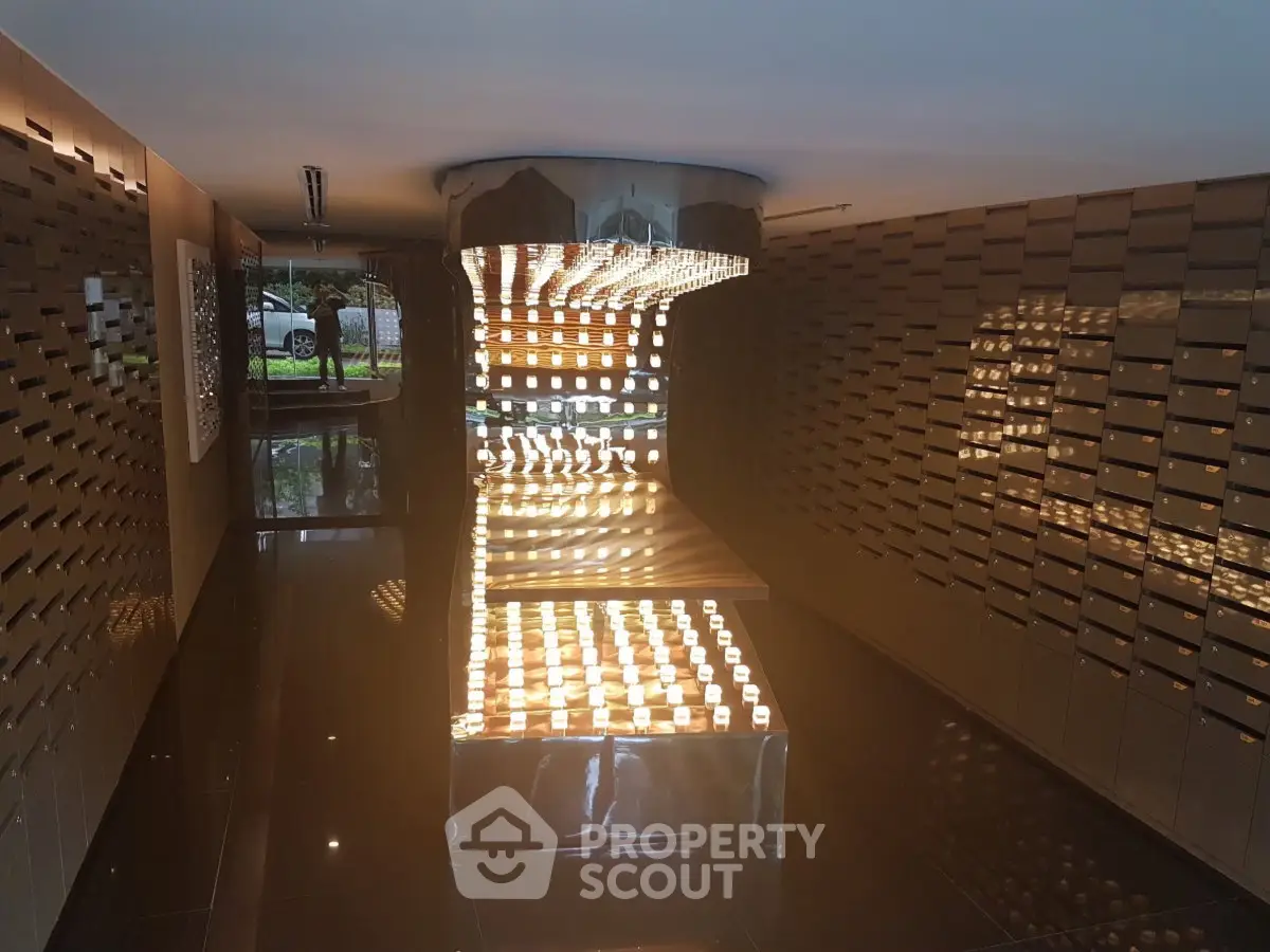 Luxurious building entrance with modern lighting and sleek design