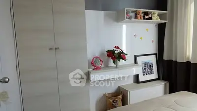 Charming bedroom with modern decor and ample storage space