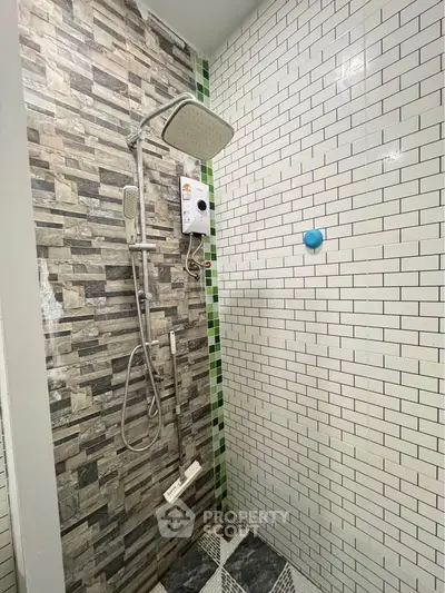 Modern bathroom with stylish shower and tiled walls in contemporary design.