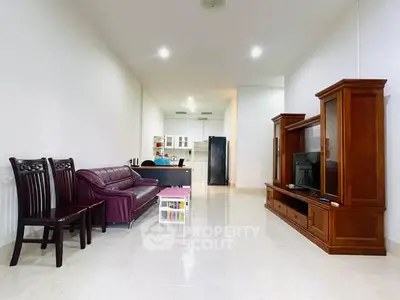 Spacious living room with elegant wooden furniture and modern decor