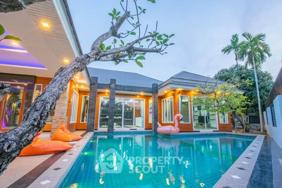 Luxurious modern villa with stunning pool and tropical garden ambiance
