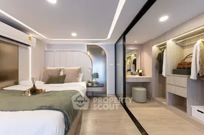 Luxurious modern bedroom with walk-in closet and elegant decor