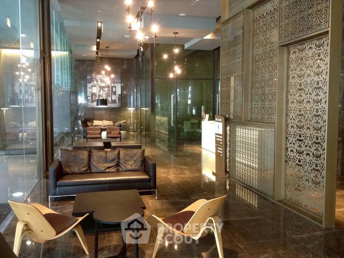 Luxurious modern living room with elegant decor and stylish furniture in a high-end property.