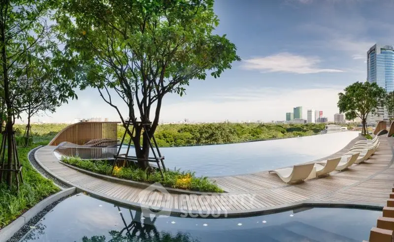 Luxurious rooftop infinity pool with stunning city skyline view and lush greenery.