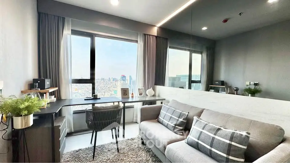 Modern living room with city view, featuring stylish decor and comfortable seating.