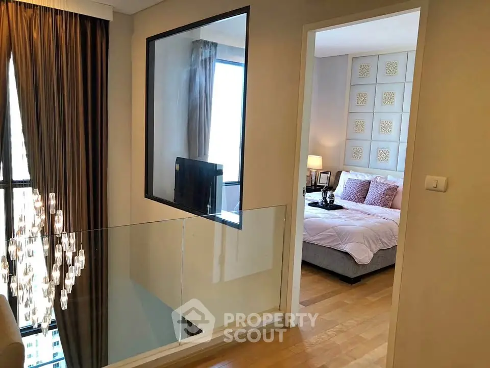 Luxurious bedroom with elegant decor and modern lighting in a stylish apartment