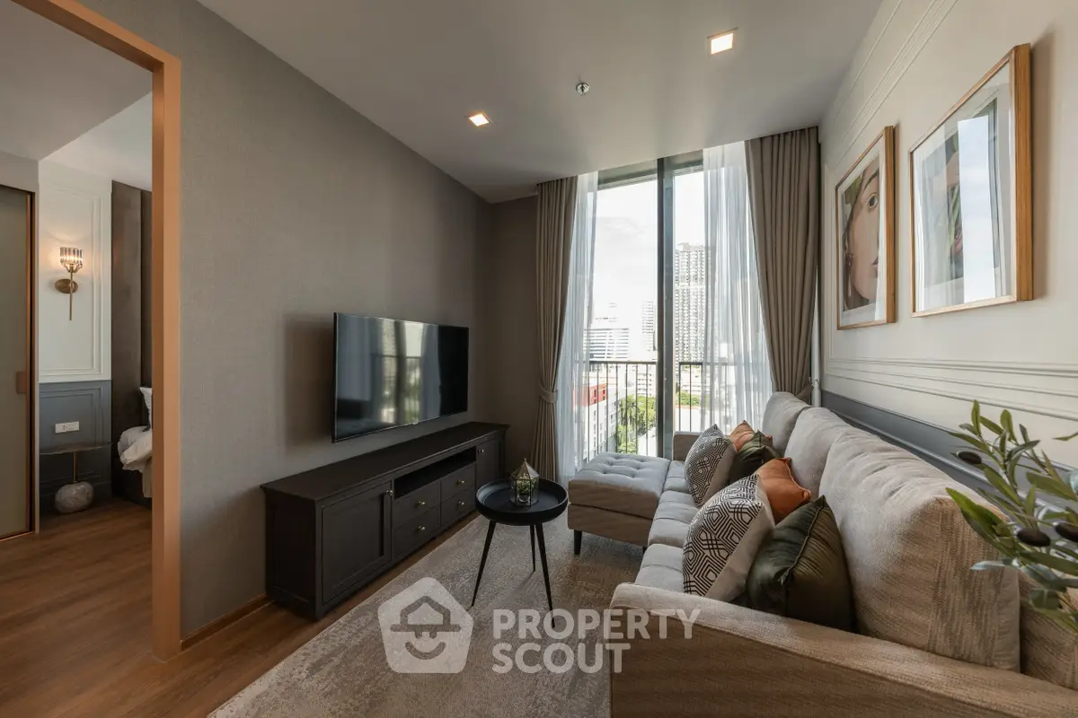 Modern living room with stylish decor and city view from large window