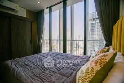 Luxurious bedroom with stunning city view and modern decor