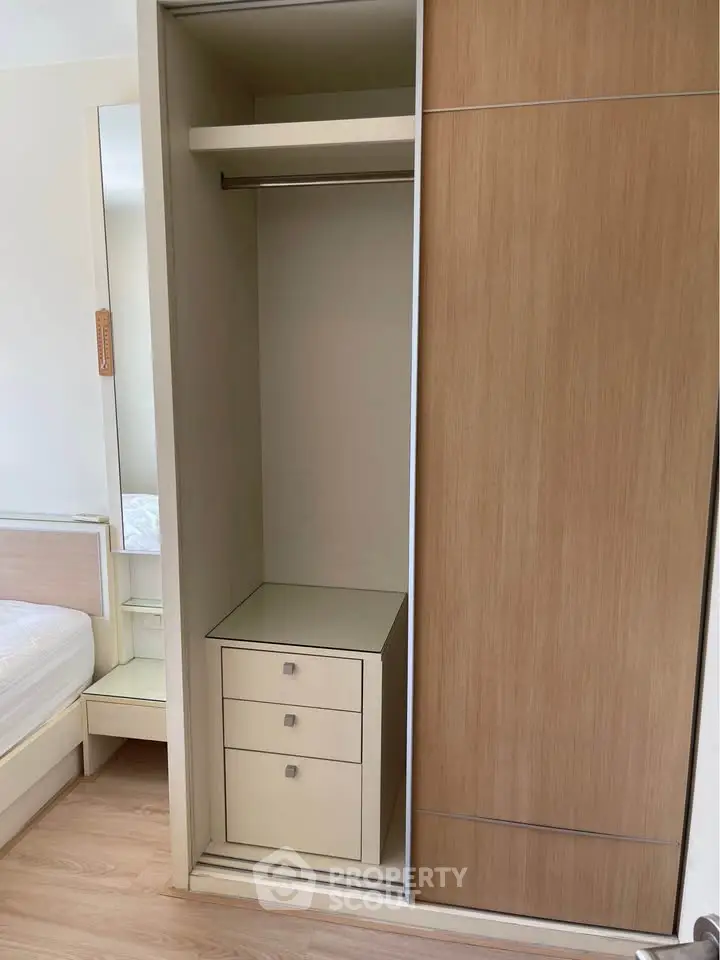 Spacious bedroom with built-in wardrobe and modern design