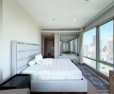 Luxurious bedroom with panoramic city view and modern decor